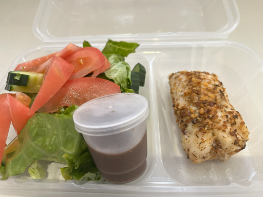 Moroccan baked fish with salad